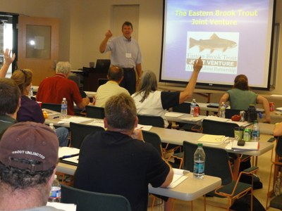 Photo 1 from the June 2012 Partnership Meeting showing Steering Committee Chairman, Doug Stang, welcoming the group.