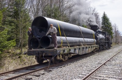 Photo (2) of Train Transporting New Culvert to Lamothe Site