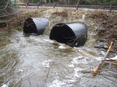 Photo looking upstream at the culverts to be replaced on Jam Black Brook in Maine.