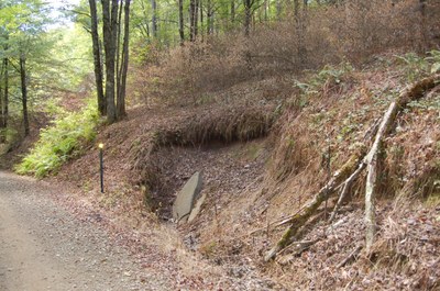 Photo showing improper drainage from dirt and gravel roads on Cross Fork, PA.