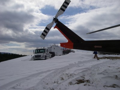 Photo of Fuel Truck and Helicopter Working on St. Mary's Project in Virginia.  Around 22 inches of snow fell the day before this photo.